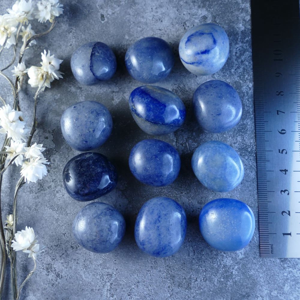 Blue Aventurine Crystal Tumbles - Enhance your well-being with Dumi's Crystals. These polished blue stones promote mental clarity, emotional balance, and spiritual growth. Each measures 2-3cm, ideal for meditation or carrying. 