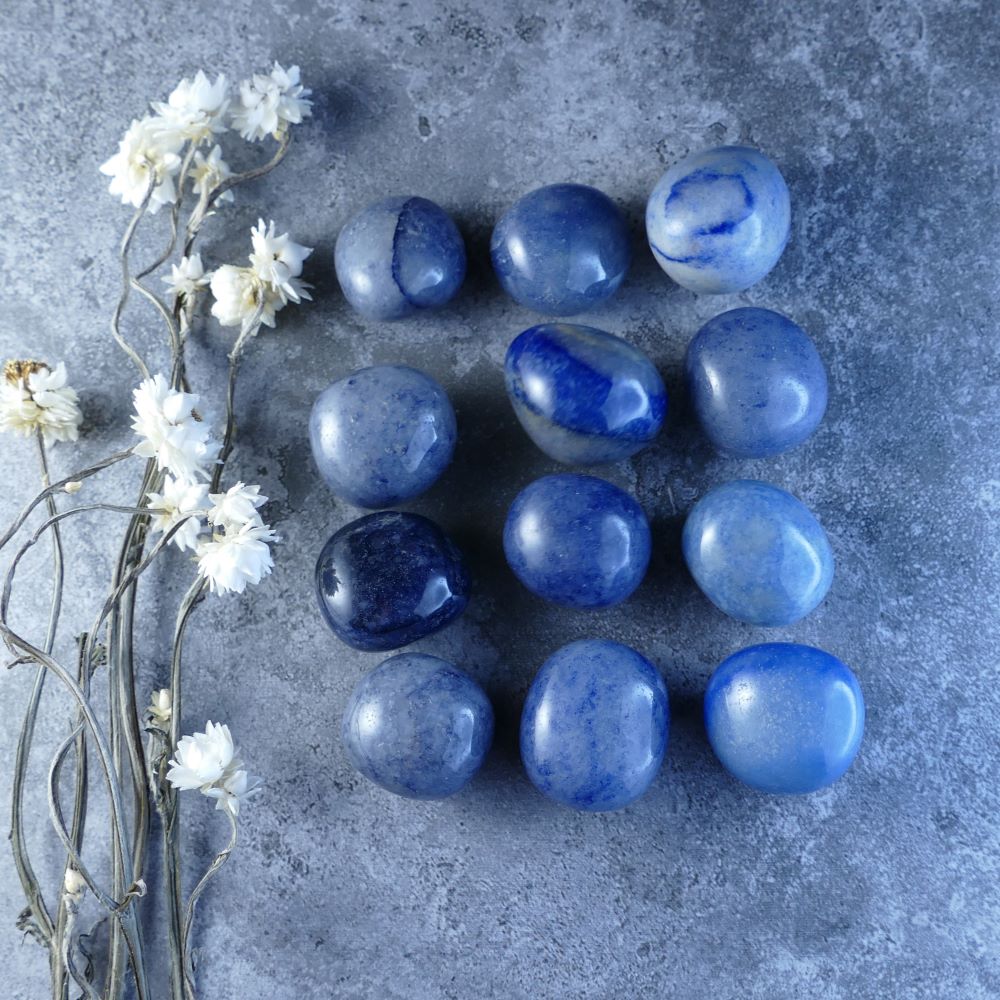 Calming Blue Aventurine Tumbles - Dumi's Crystals - Soothing blue stones for mental clarity, emotional balance, and spiritual growth. Polished to a smooth finish, these 2-3cm stones are perfect for meditation or carrying. 