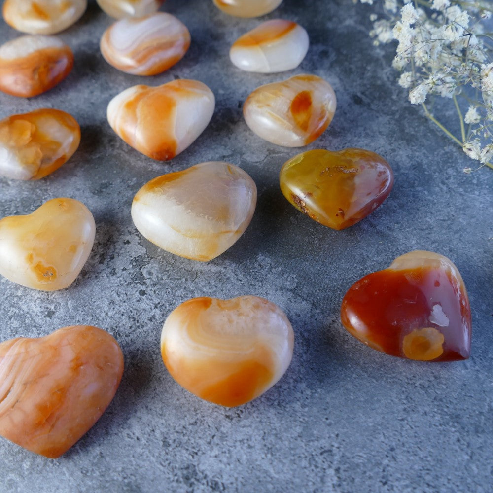 Dumi's Crystals - Carnelian Puffy Hearts (2.5-3cm, 10-20g) - Spark your inner flame! Carnelian's warmth and vibrant energy uplift and inspire. A perfect pocket crystal.