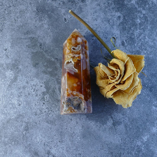 Red Flower Agate Tower (Sakura Agate) - Natural stone tower featuring vibrant red, cream, and brown hues resembling a delicate flower garden. Ideal for meditation, crystal healing, or home decor.