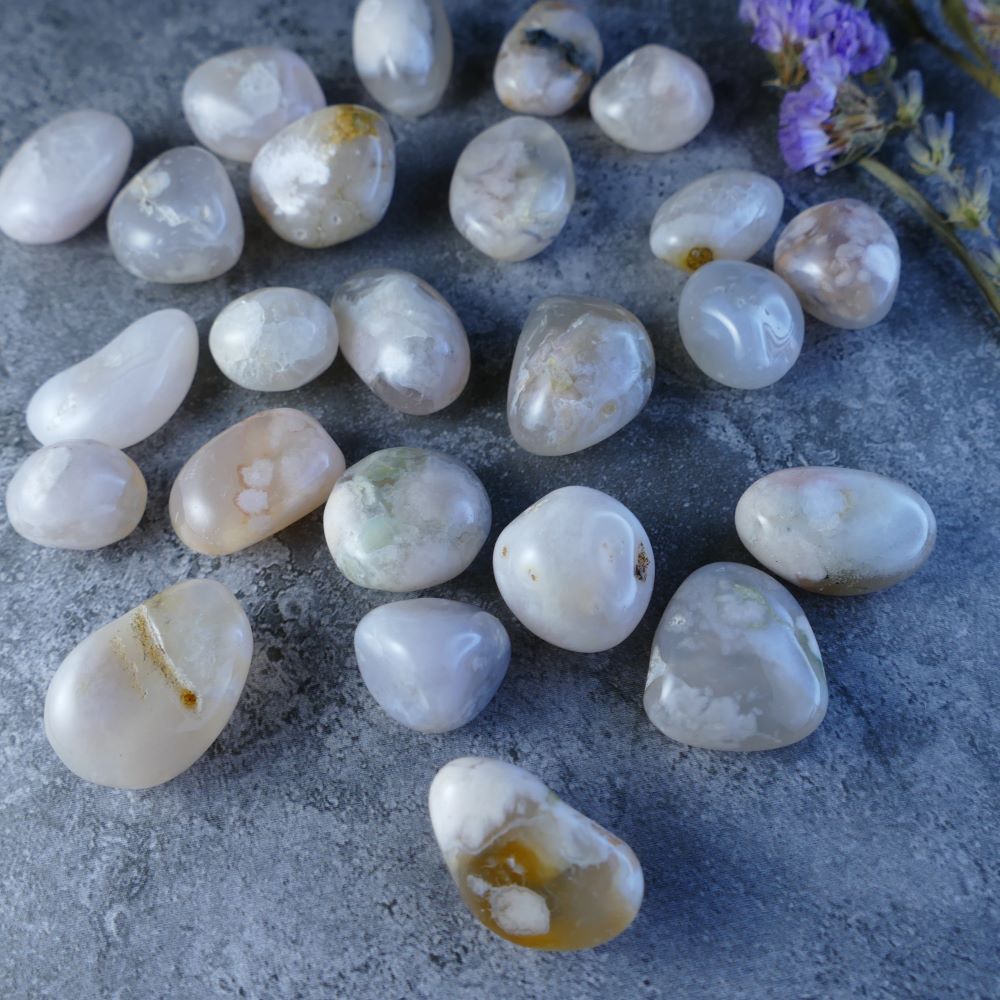 Flower Agate Crystal Tumbles - Embrace transformation! Dumi's Crystals offers enchanting Flower Agate stones (1.5-2cm, 5g) with mesmerizing floral patterns in soft hues. 