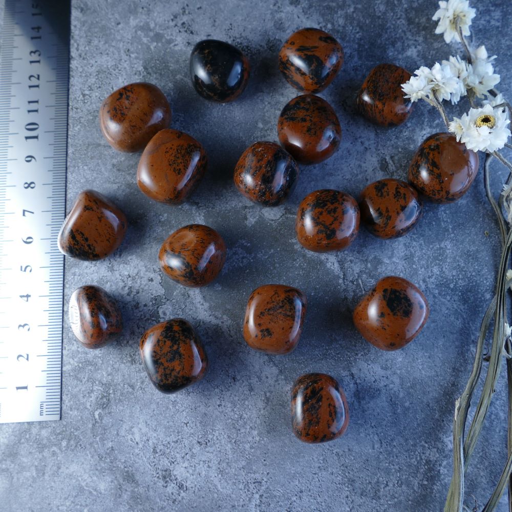 Rich Brown Obsidian Tumbles - Dumi's Crystals - Mahogany Obsidian, a powerful stone for grounding and protection. Deep brown tones, 2-2.5cm each, ideal for crystal healing enthusiasts.