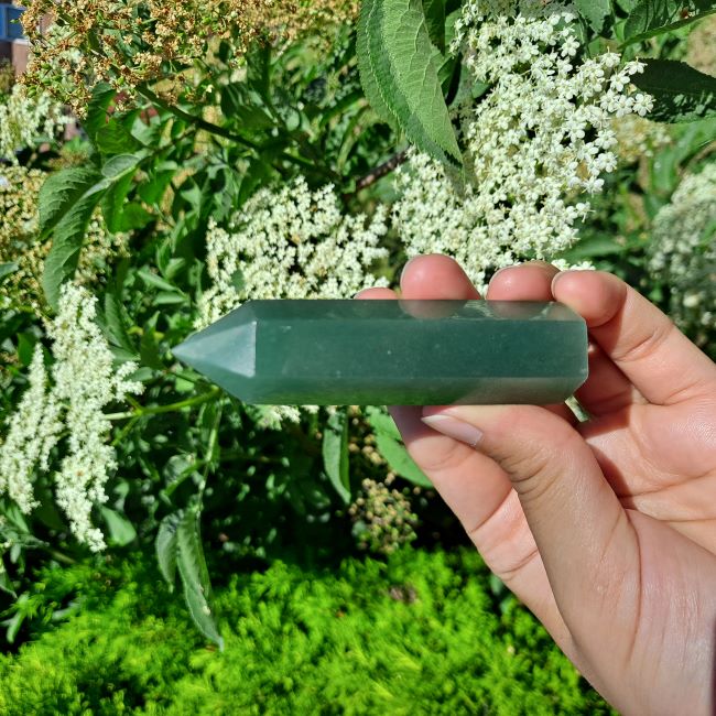 Dumi's Crystals | Green Aventurine Tower (7-9cm) | A close-up view of a captivating Green Aventurine Tower (7-9cm), showcasing its mesmerizing hues of green and intricate patterns. This crystal is believed to attract abundance, prosperity & promote emotional healing.