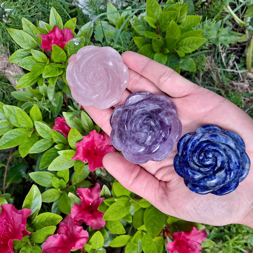 Dumi's Crystals | Amethyst Rose Carving (Peace & Tranquility) | A handful of Amethyst Rose Carvings radiate calming energy. Amethyst, February's birthstone, promotes peace, spiritual awareness & beauty. Hold them during meditation or display in your home to cultivate tranquility, uplift your spirit & connect with your inner wisdom. Embrace the magic of Amethyst Rose Carvings from Dumi's Crystals!